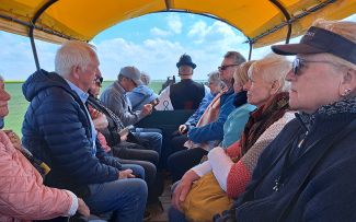 'Puszta' sightseeing wagon with tourists, Dunapataj outskirt.