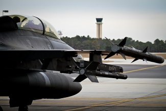 “ U.S. Air Force F-16 Fighting Falcon from the New Jersey Air National Guard's 177th Fighter Wing prepares to taxi for take off from Atlantic City International Airport, N.J., Jan. 28 during an intercept exercise involving the Civil Air Patrol in preparation for Super Bowl XLVIII. U.S. Air Force assets will be part of a joint team involving the FBI, Customs and Border Protection, Civil Air Patrol and the FAA providing security for the Super Bowl in the air on game day. (U.S. Air National Guard photo by Tech