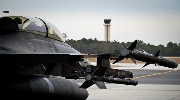 “ U.S. Air Force F-16 Fighting Falcon from the New Jersey Air National Guard's 177th Fighter Wing prepares to taxi for take off from Atlantic City International Airport, N.J., Jan. 28 during an intercept exercise involving the Civil Air Patrol in preparation for Super Bowl XLVIII. U.S. Air Force assets will be part of a joint team involving the FBI, Customs and Border Protection, Civil Air Patrol and the FAA providing security for the Super Bowl in the air on game day. (U.S. Air National Guard photo by Tech