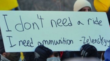 Photo with a description "I don't need a ride, I need ammunition"